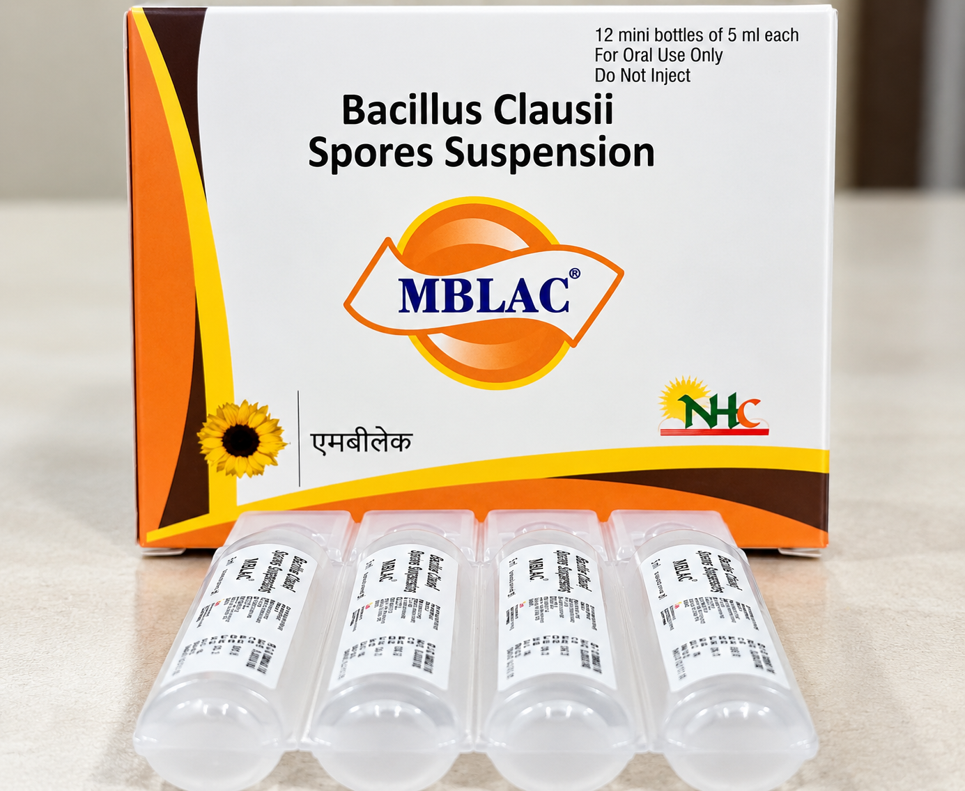MBLAC Bacillus clausii spores suspension carton and oral mini-bottles.
